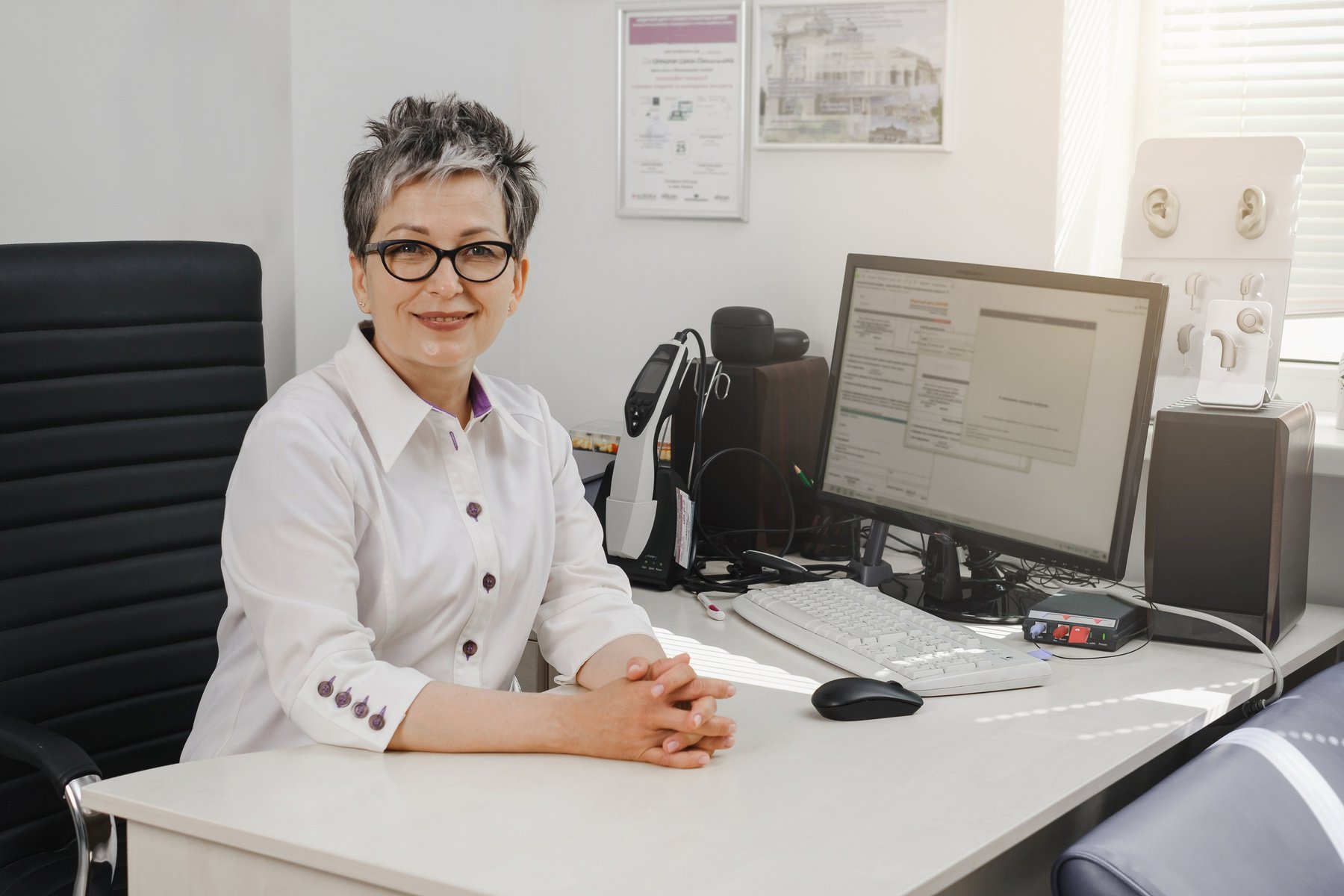 Audiologist doctor in a modern hearing clinic